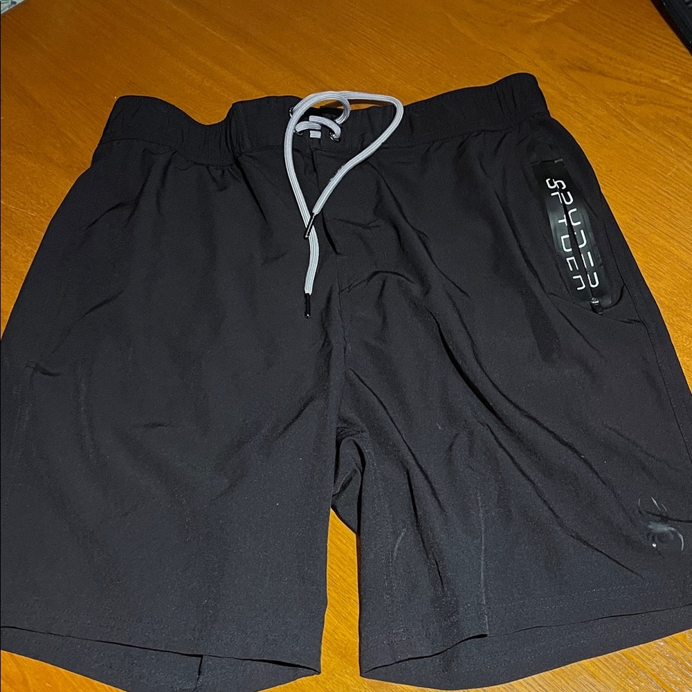 Spyder black swim /surf/sand trunks. Large. Never worn